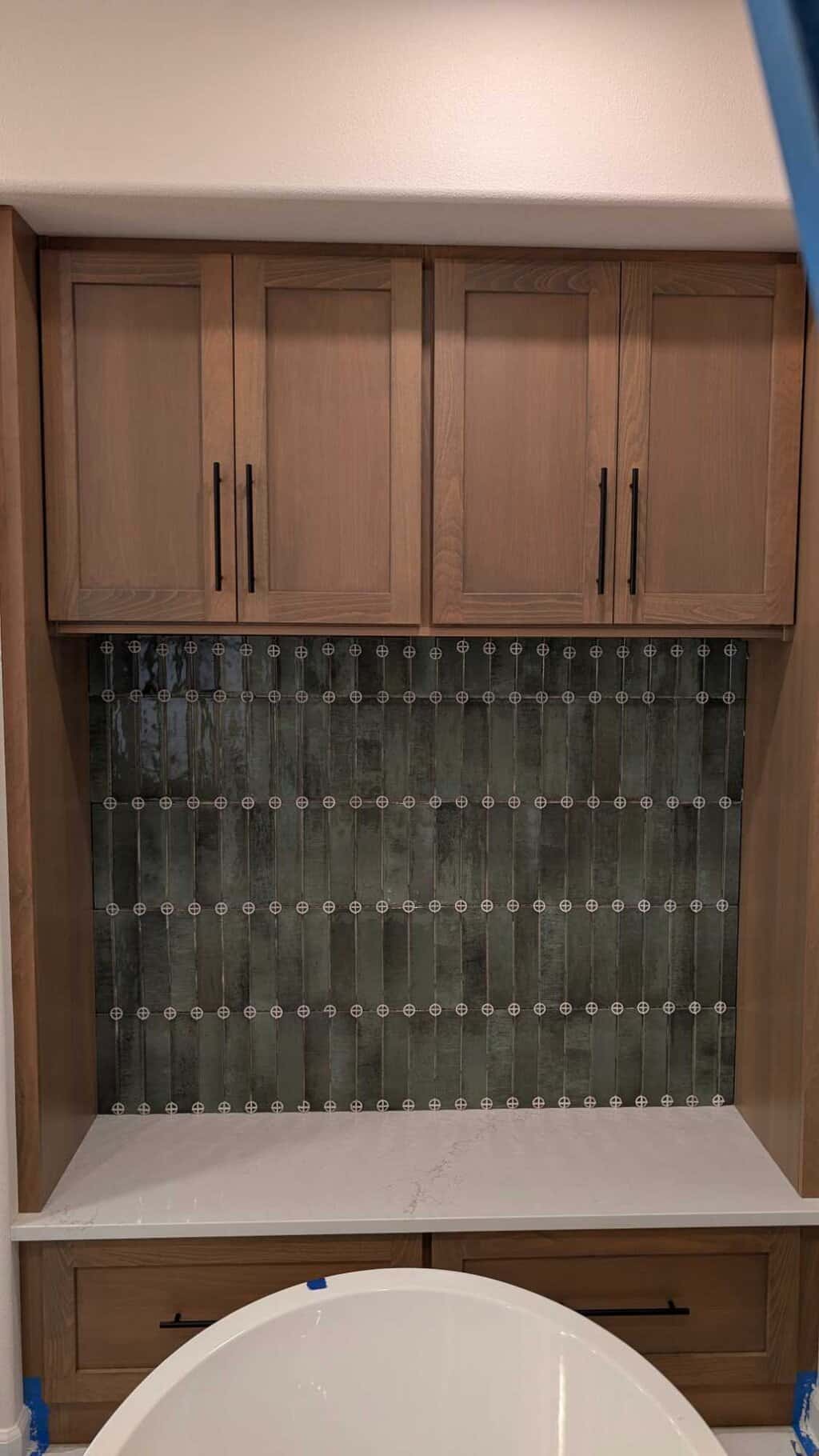 Primary bath backsplash installed