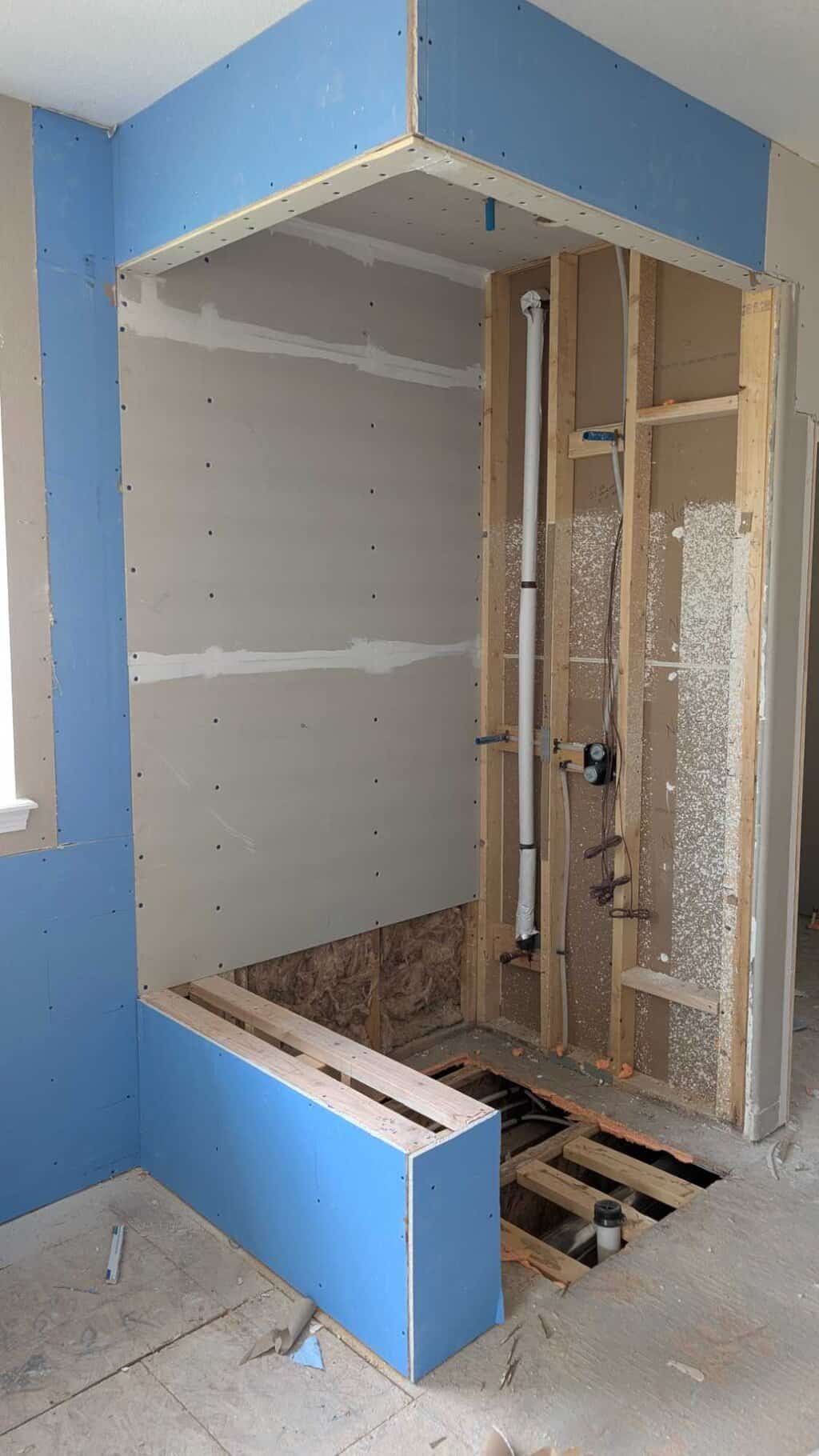 Primary shower partly underlaid