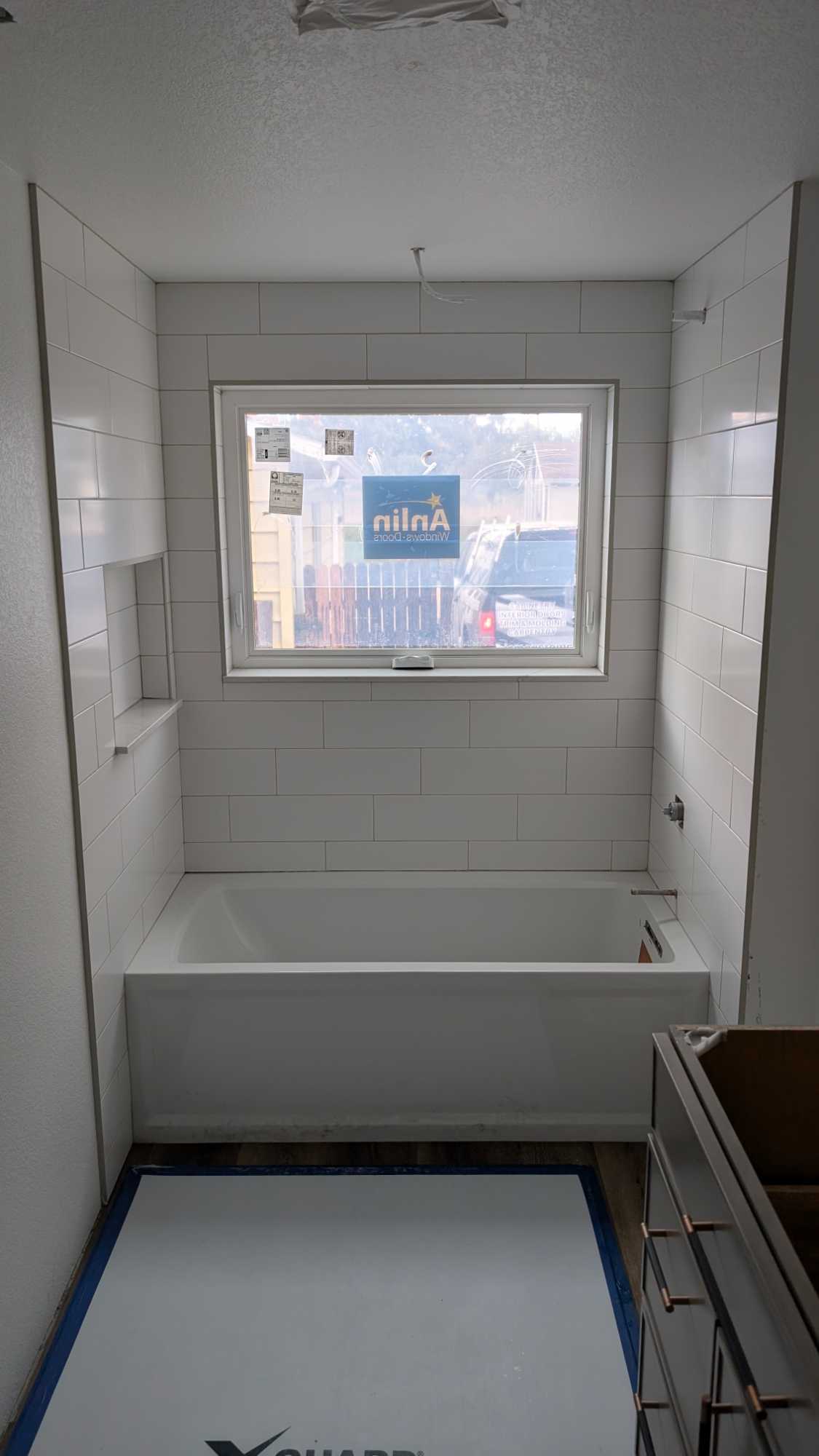 Primary tub surround grouted and finished