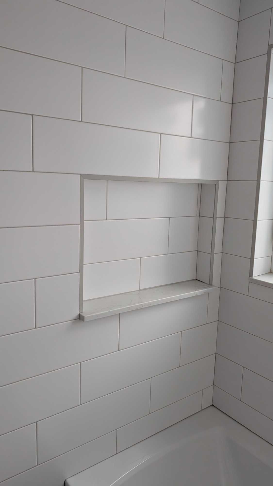 Primary tub surround grouted and finished3