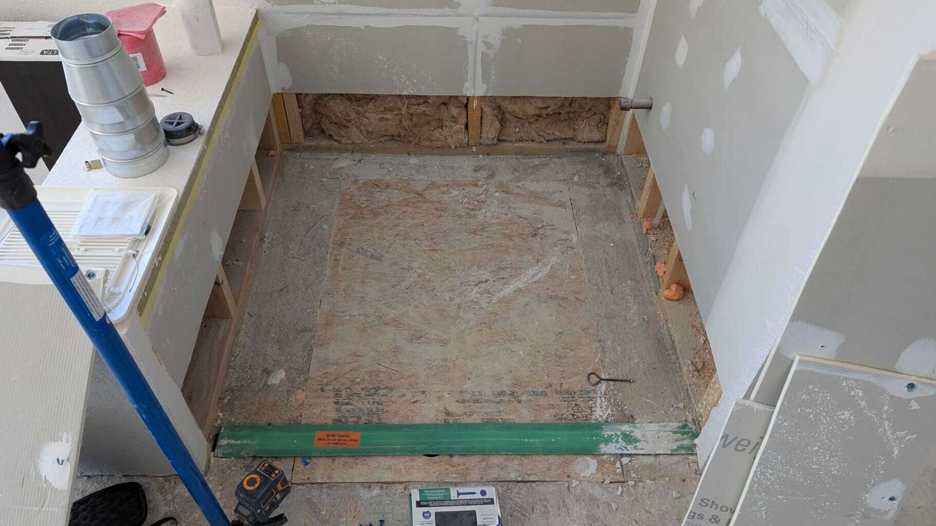 Primary shower walls opened and ready to install foam pan