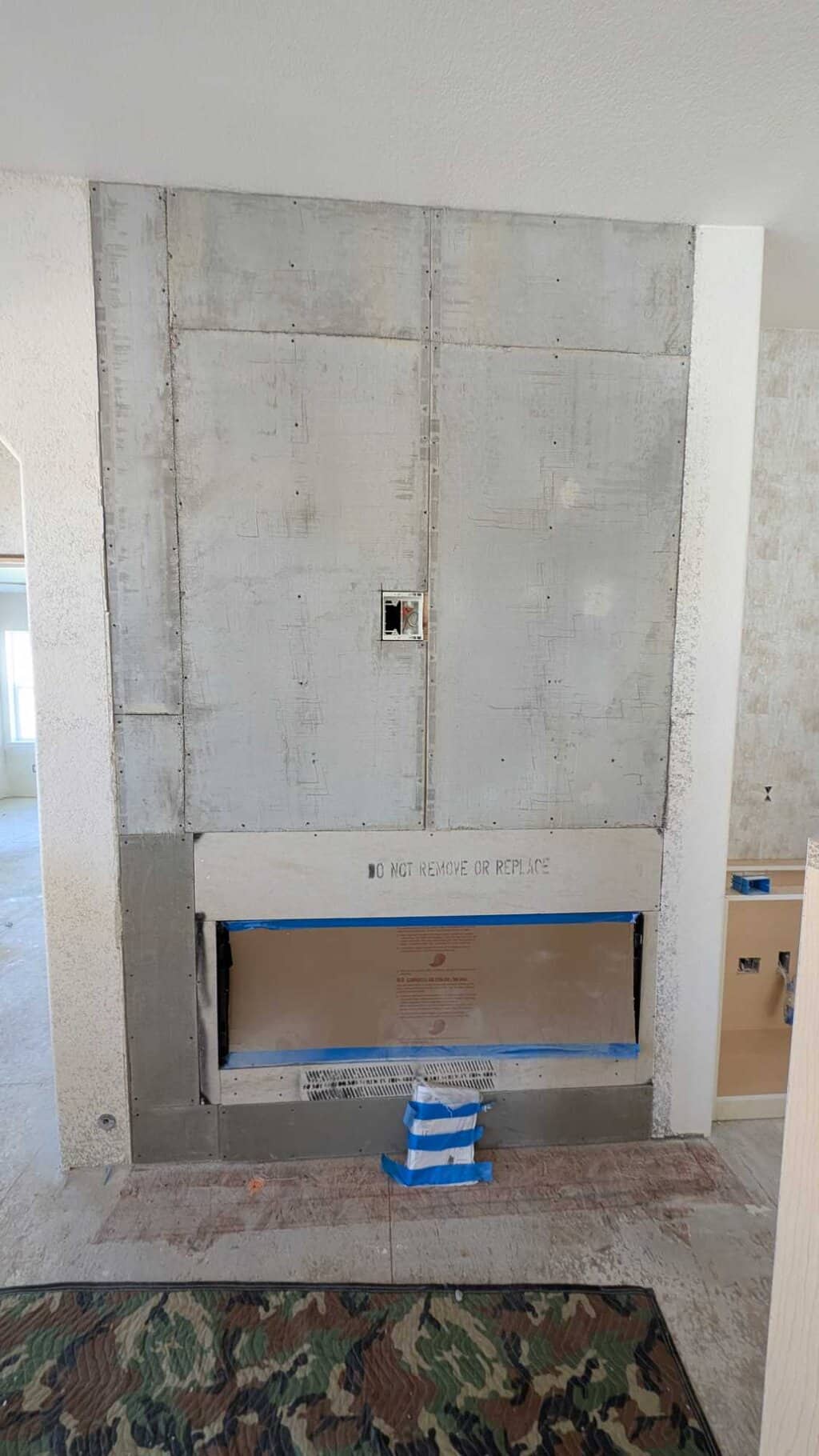 Fireplace cement board installed