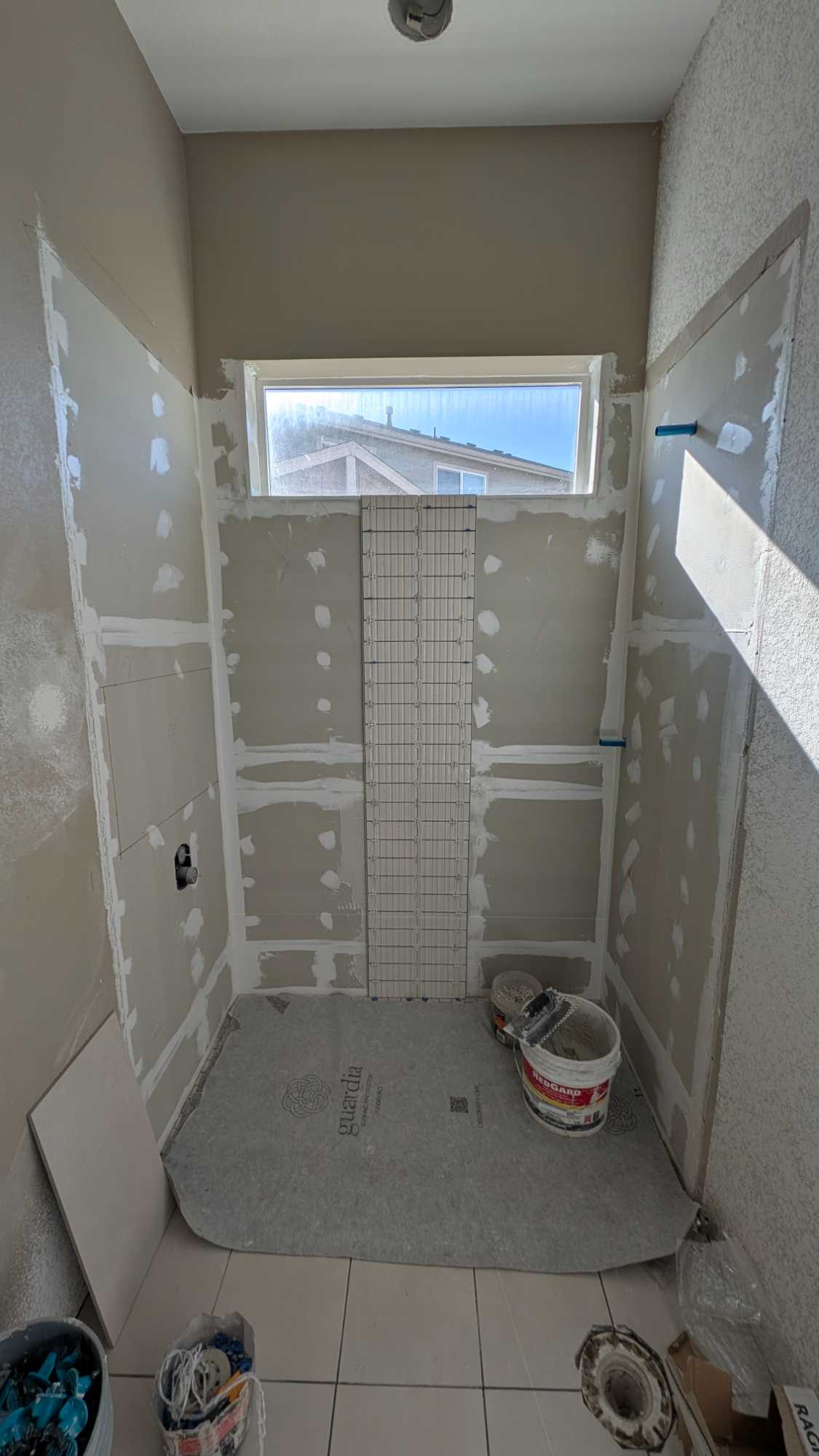 Starting to install the hall shower walls