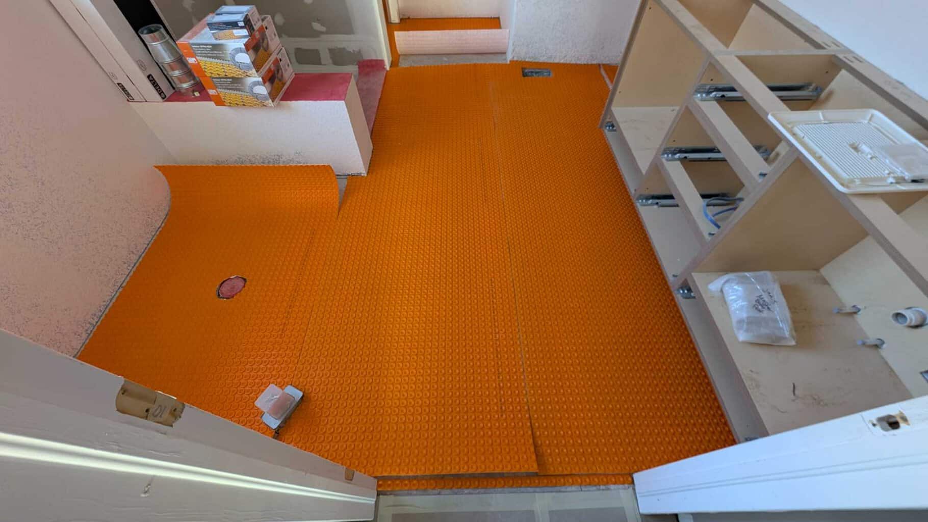 Ditra Heat has been cut and installed, but not yet thinsetted down