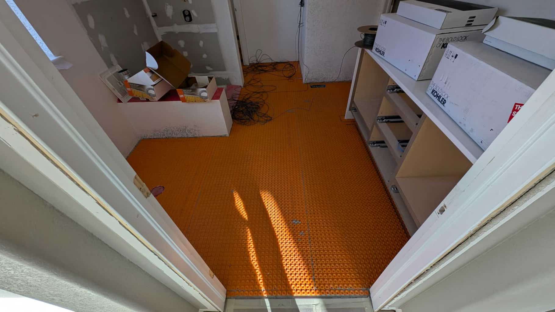 Removing all warm wire from primary bath floor