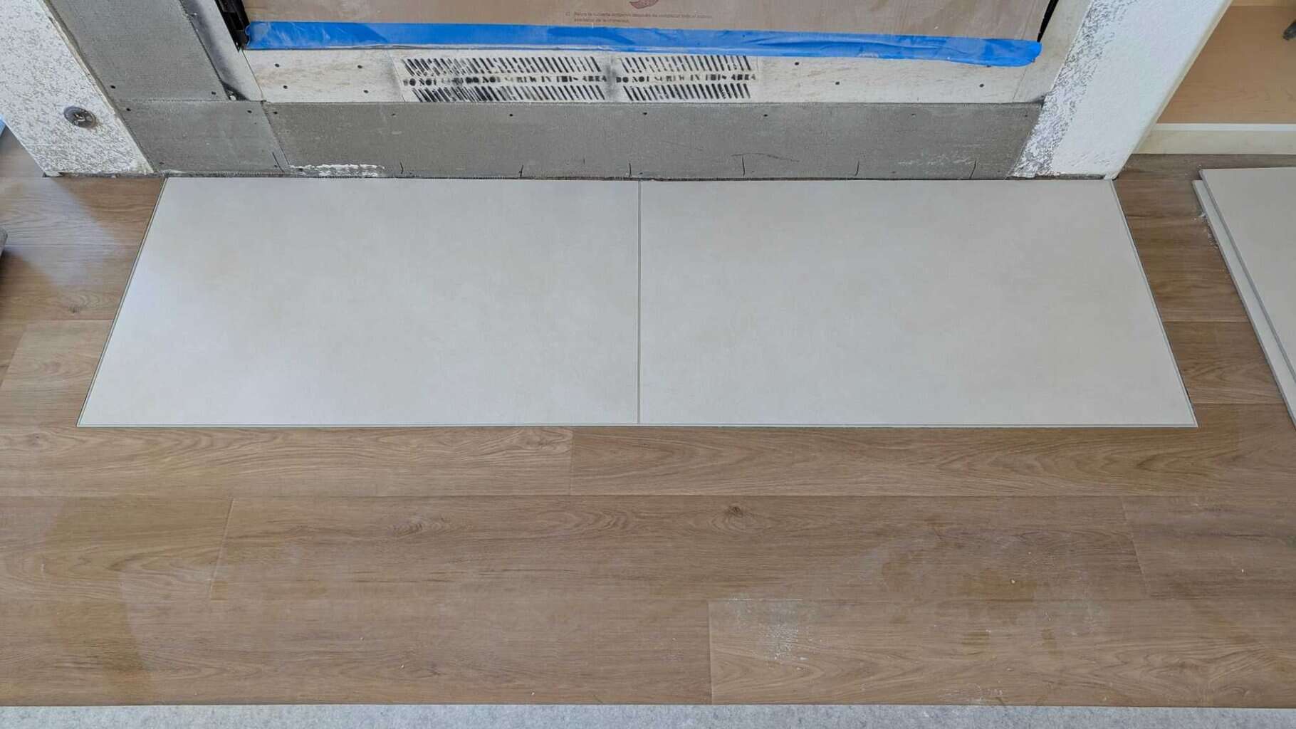 Fireplace hearth grouted and finished