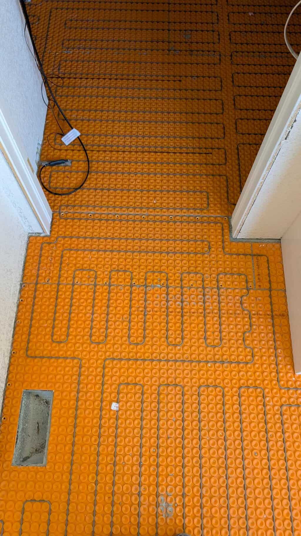 Warm wire cables installed in primary bath