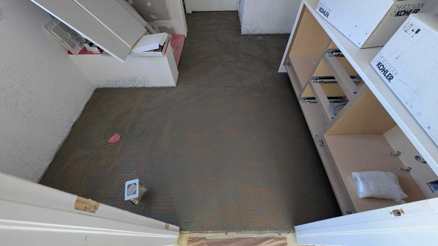 Thinset floated over primary bath warm wire