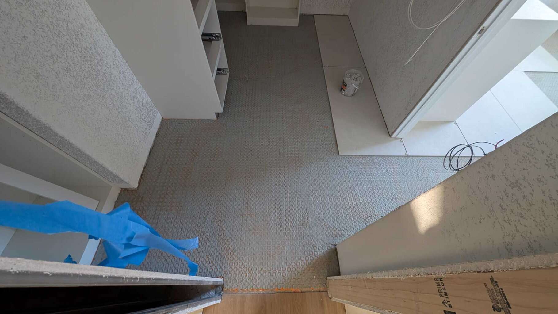 Cut and dry set a good amount of the primary bath and closet floor