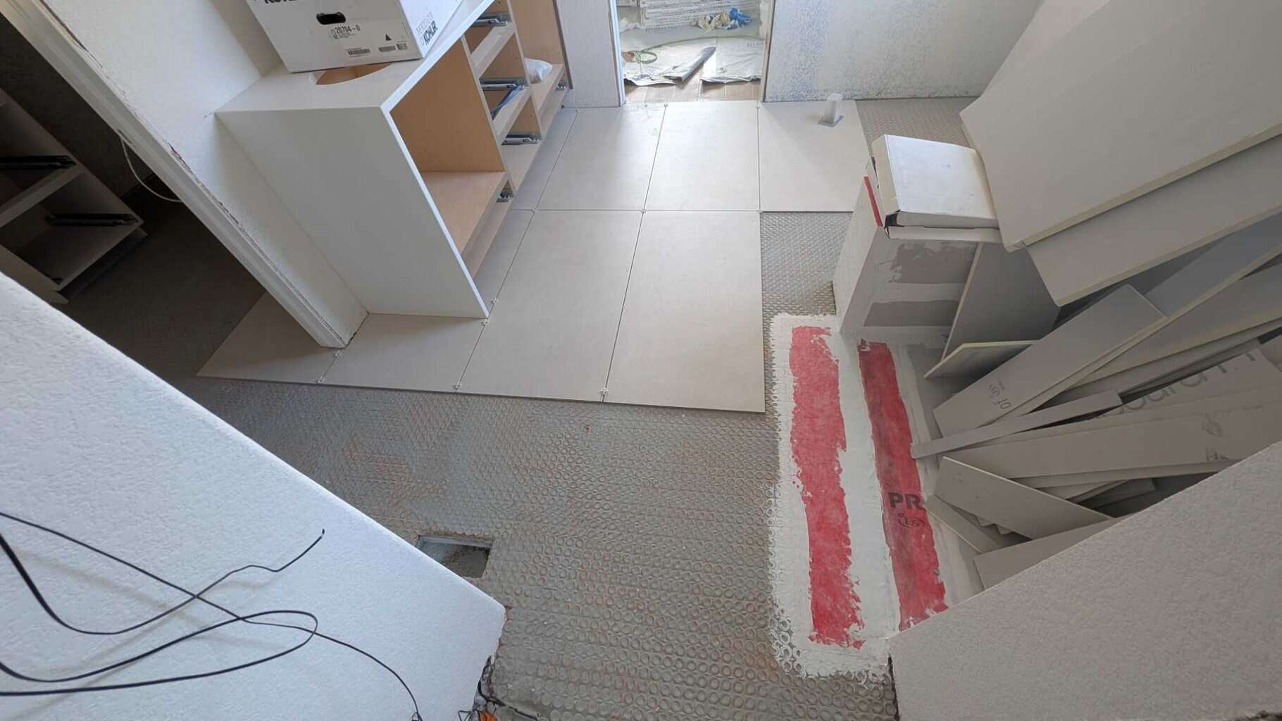 Cut and dry set a good amount of the primary bath and closet floor