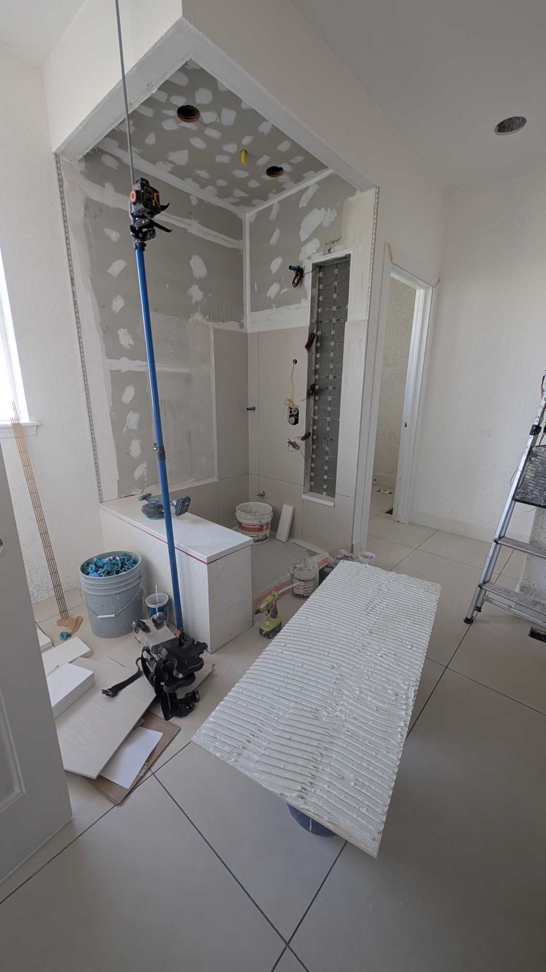 Accent tile in niche installed