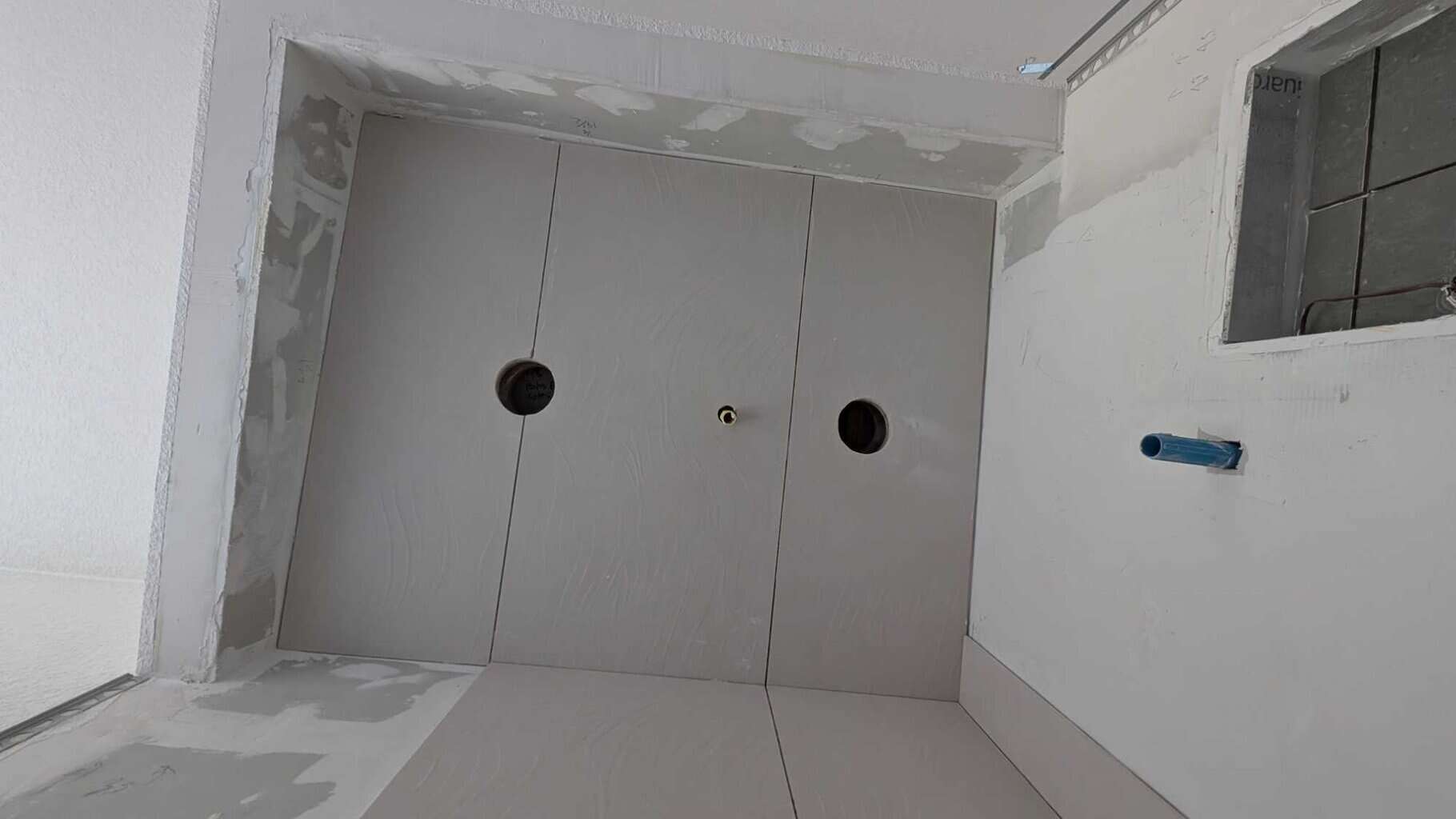 Light holes cut out in primary steam shower