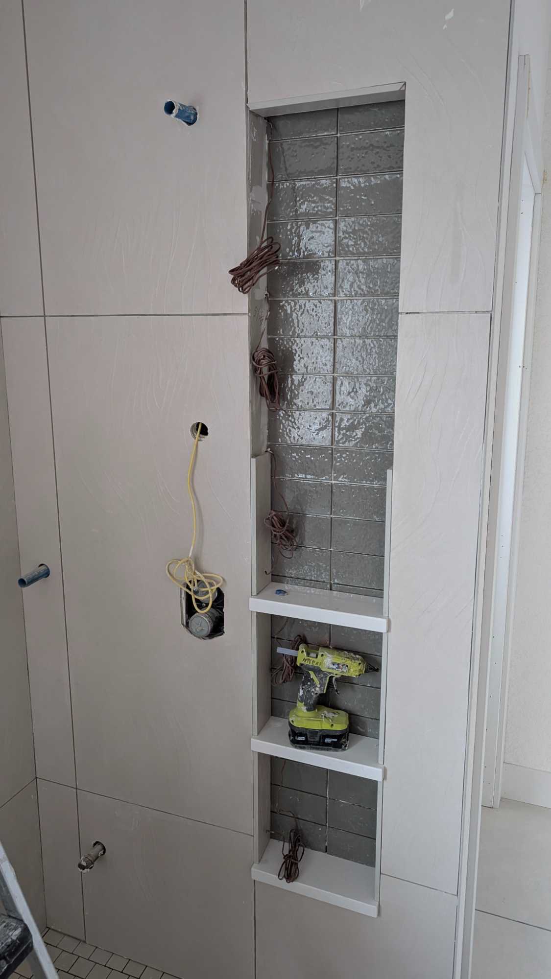 Working on finishing the primary shower niche