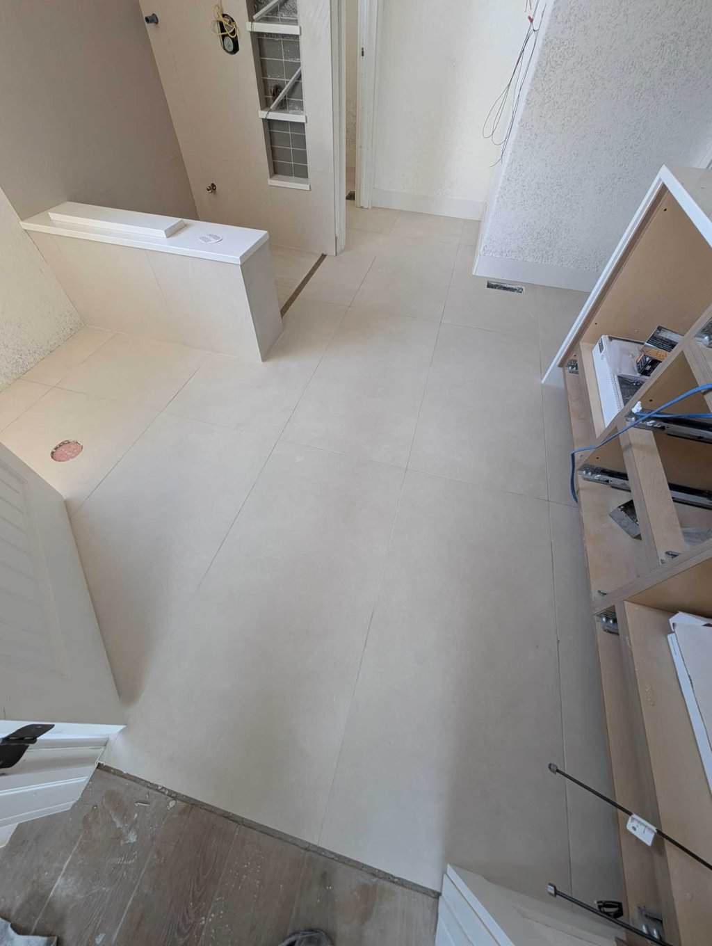 Primary bath floor grouted and finished