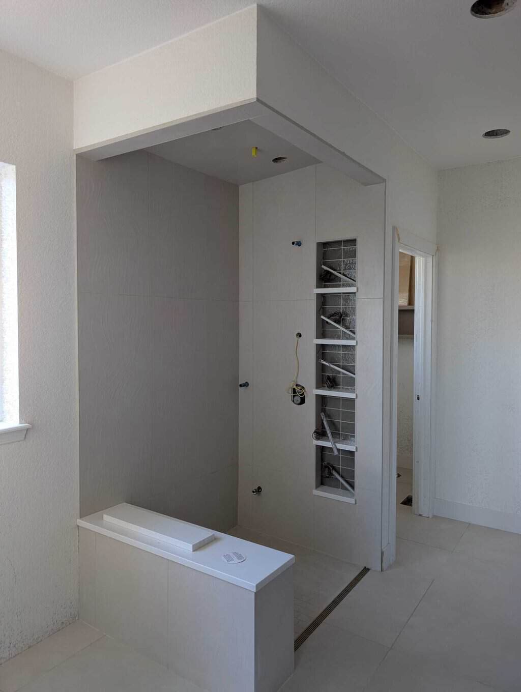 Primary shower grouted and finished