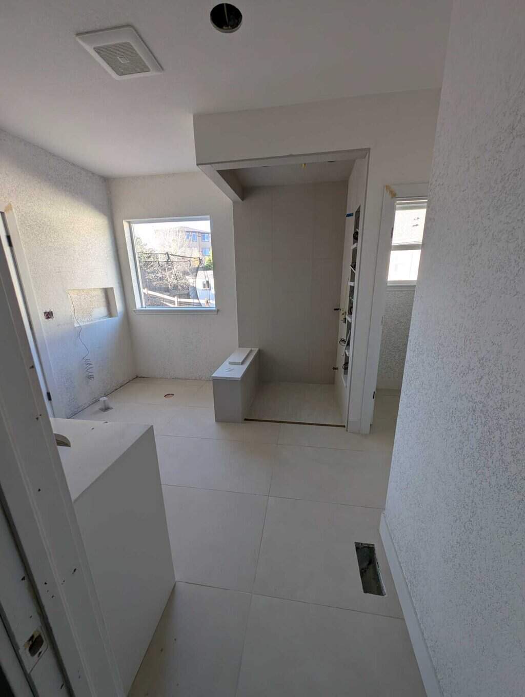 Primary shower grouted and finished