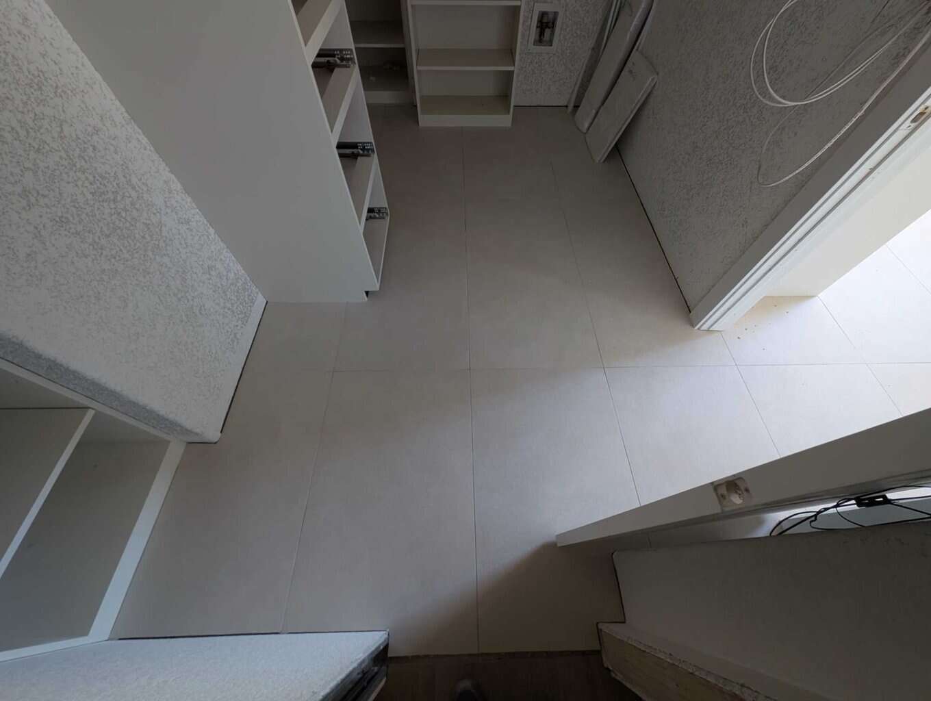 Primary closet grouted and finished