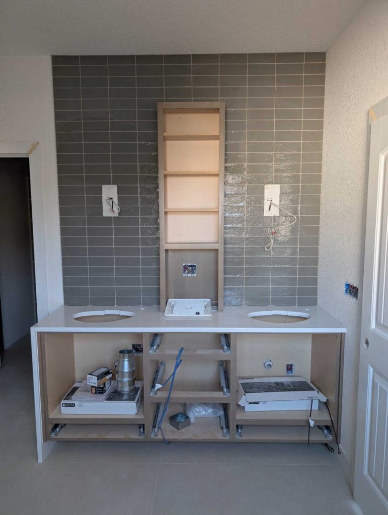 Primary bath backsplash grouted and finished