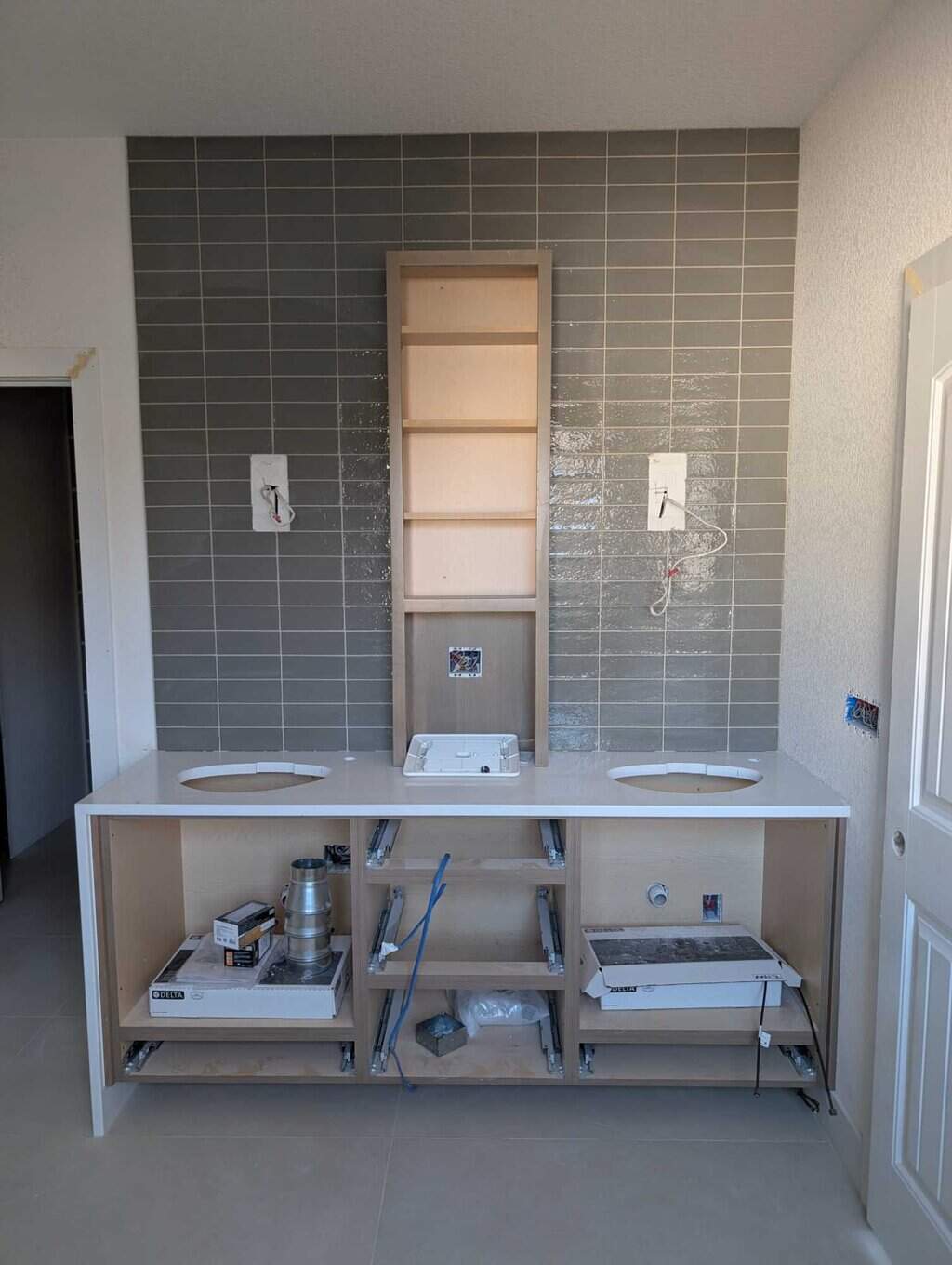 Primary bath backsplash grouted and finished