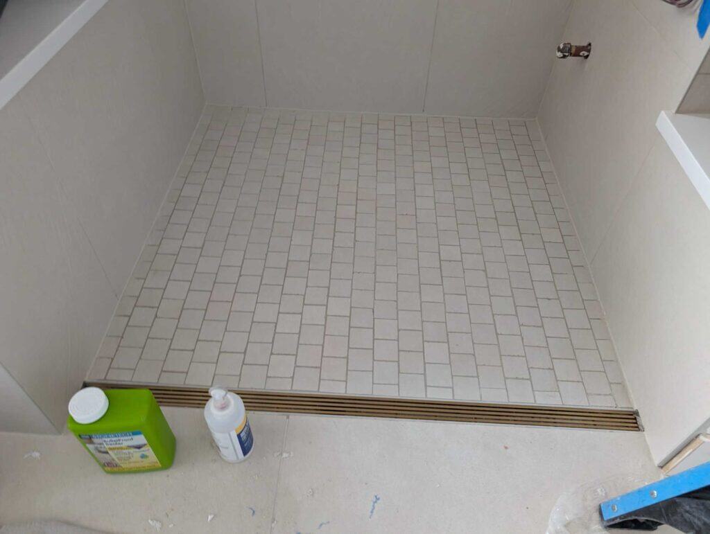 Primary shower sealed and finished
