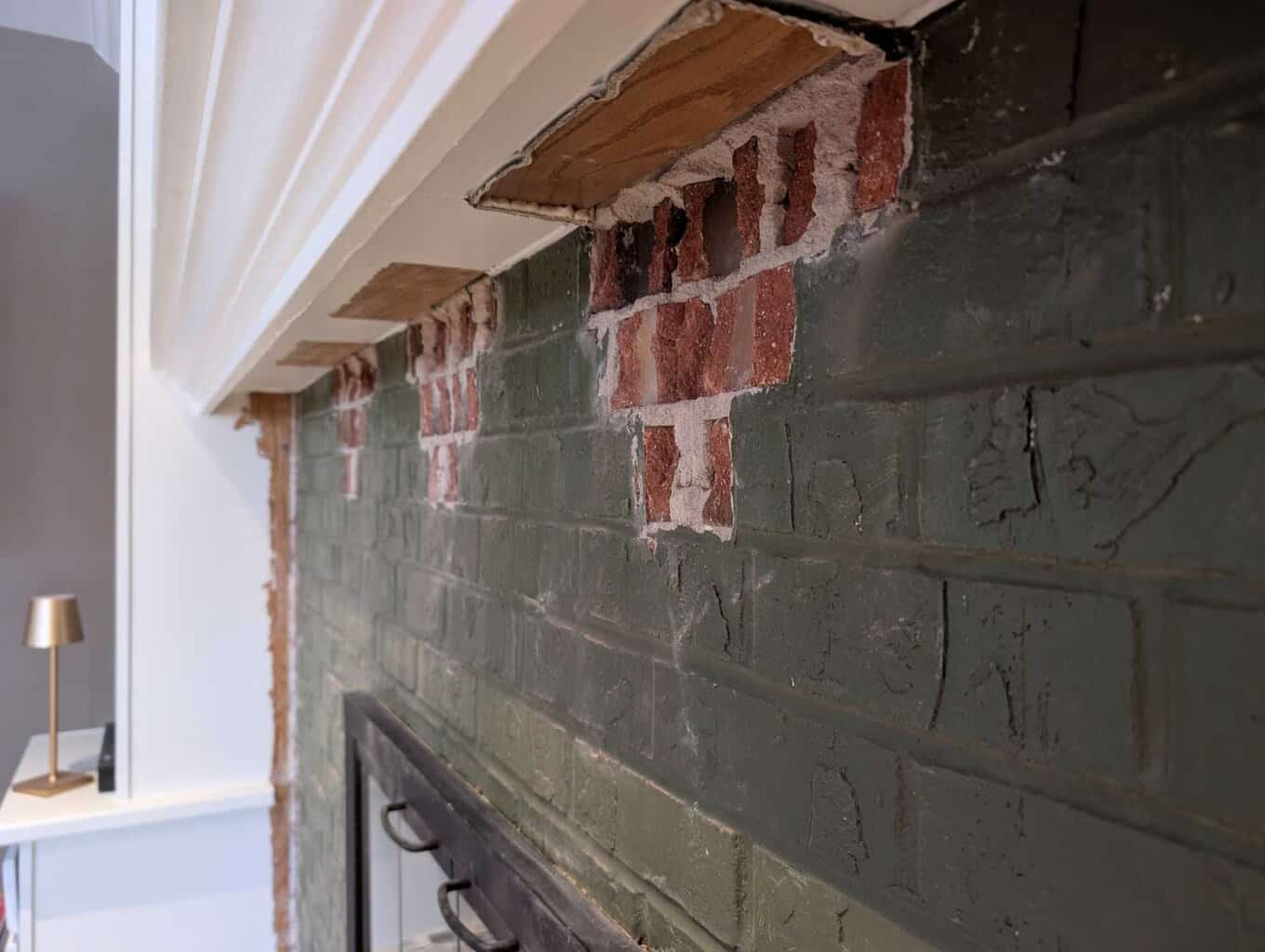 Closeup of brick corbels removed