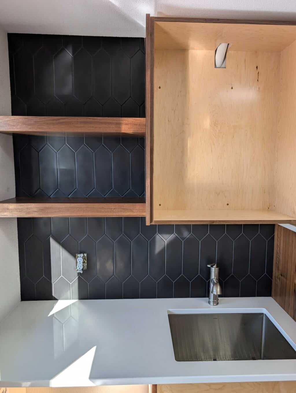 Part of backsplash grouted