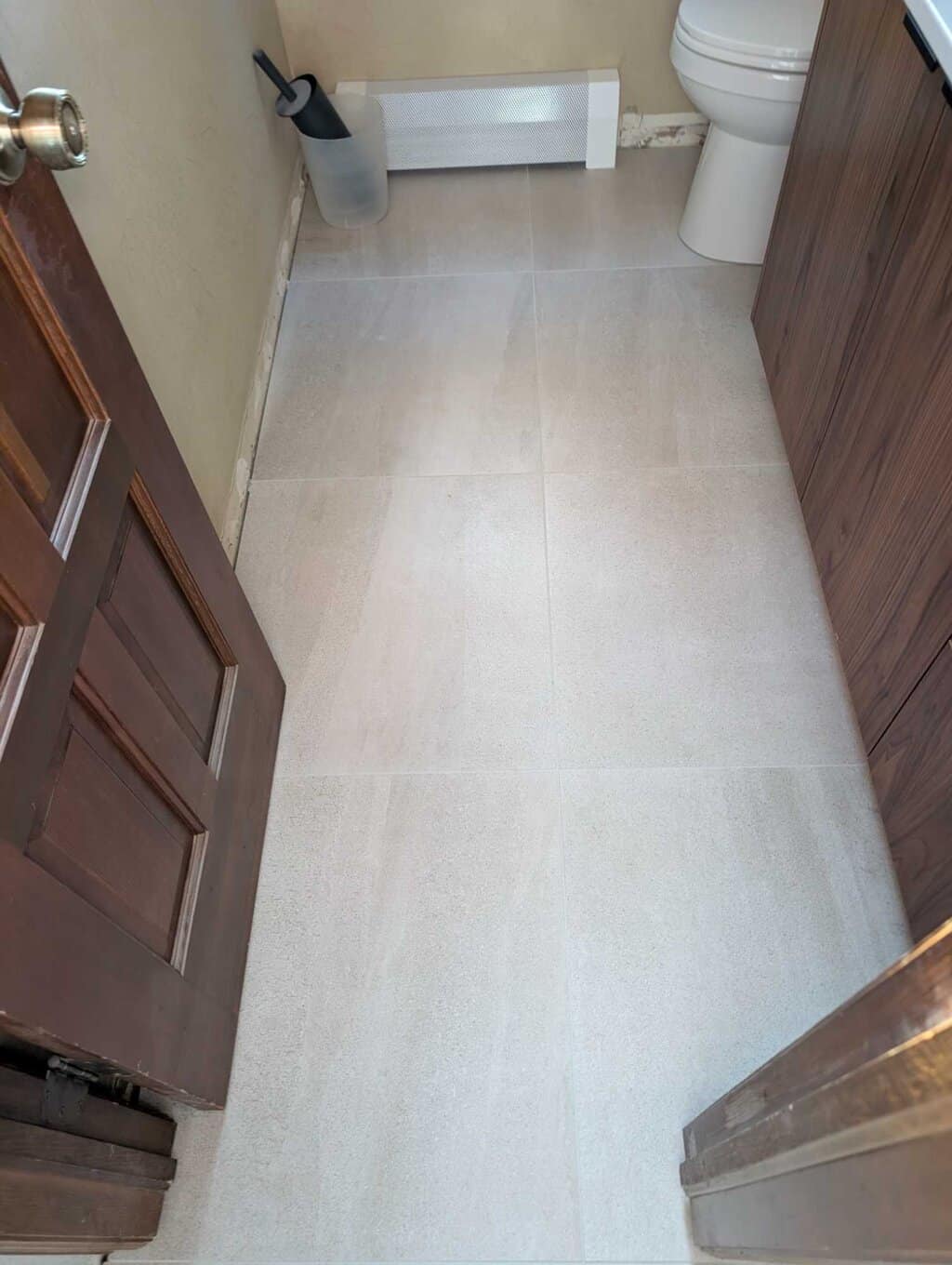 Front bathroom grout recolored