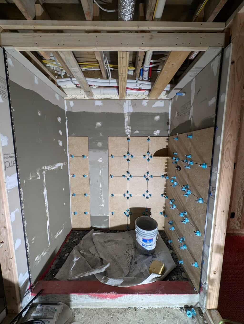 Part of shower walls tiled