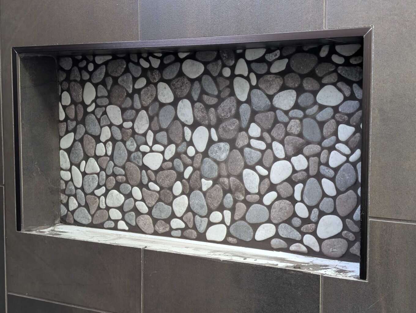 Niche grouted