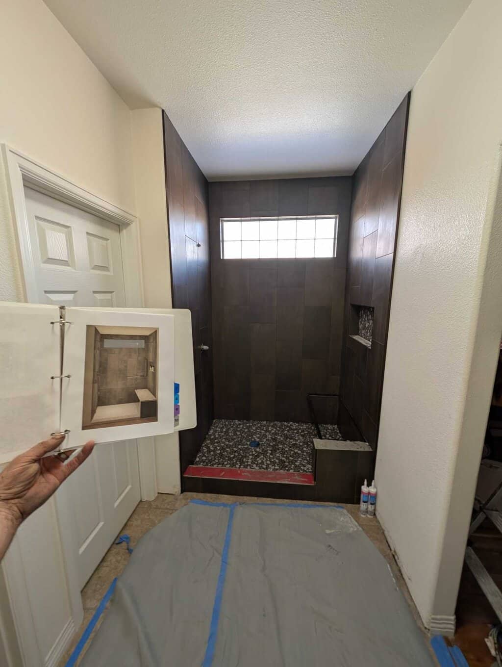 Rendering compared to the fninished shower