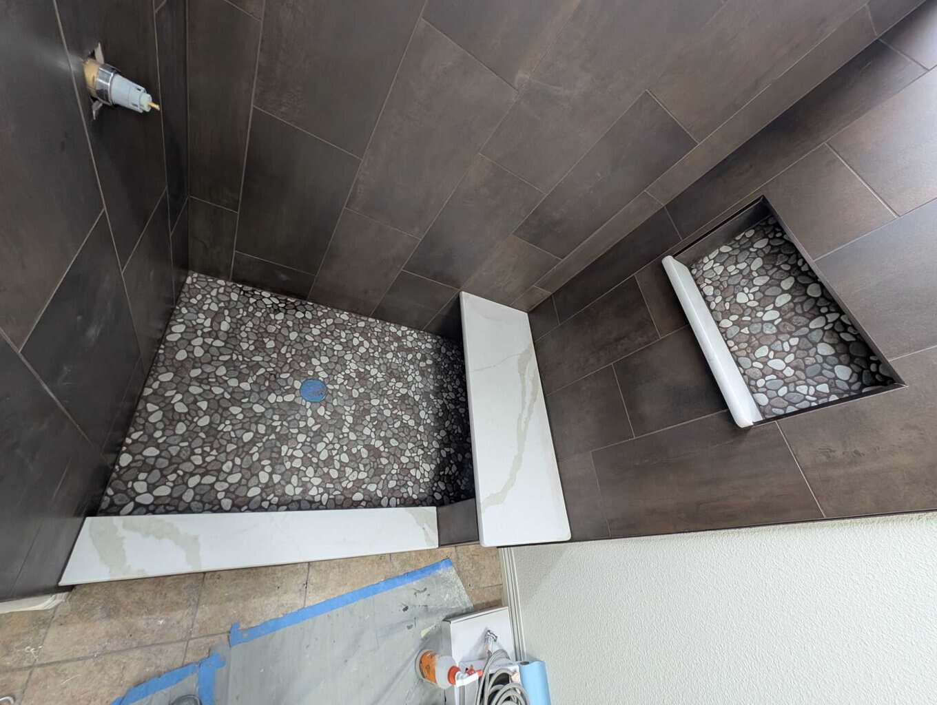 Solid surfaces installed and shower complete