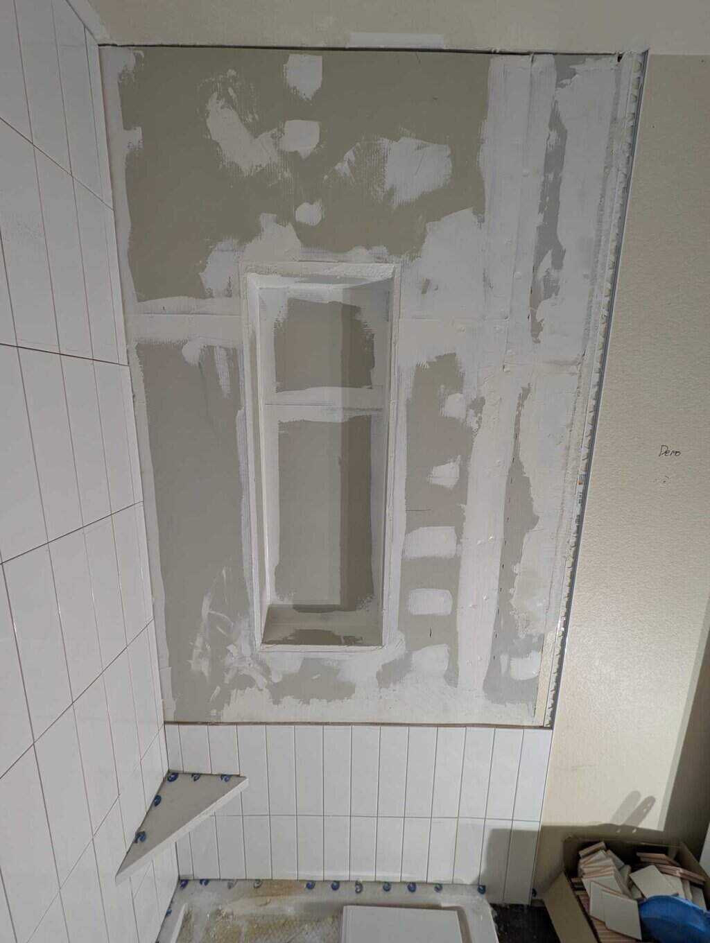 Niche cut in and built