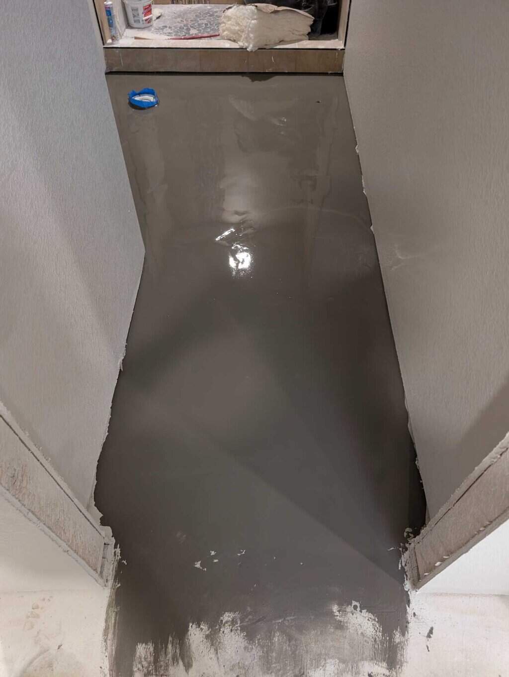 Leveler poured on bathroom floor