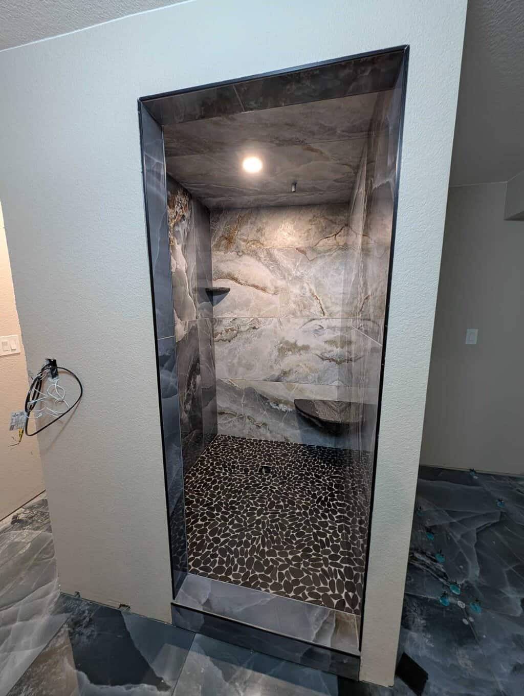 Primary shower epoxy grout installed