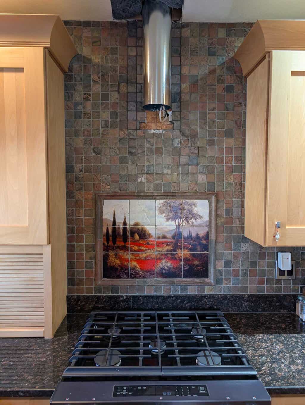 Hood tile repaired/replaced