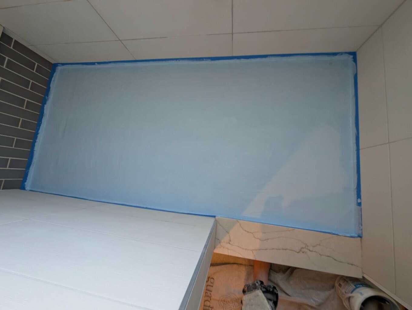 2 heavy coats of waterproofing with reinforcing fabric