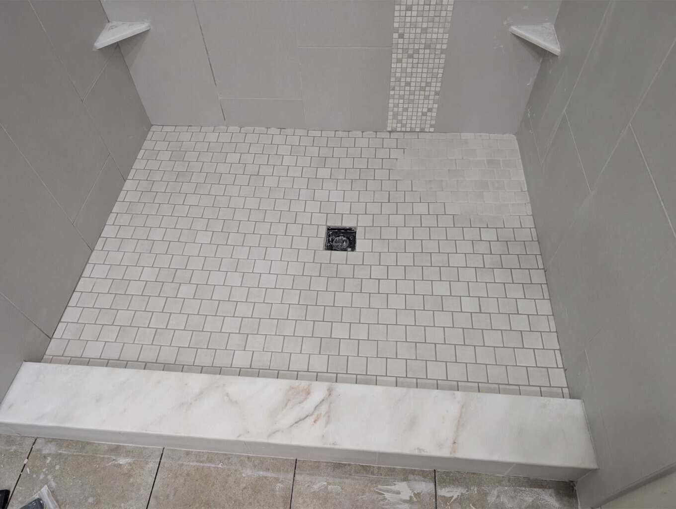 Shower floor grouted (part with 1 batch and rest with another)