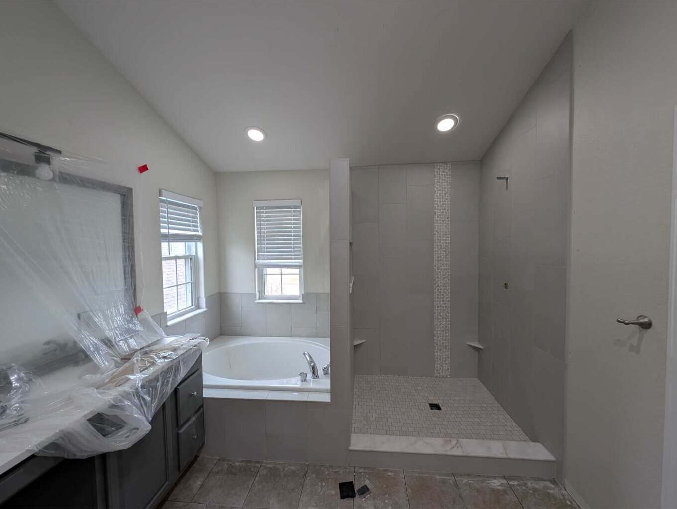 Finished primary shower and tub