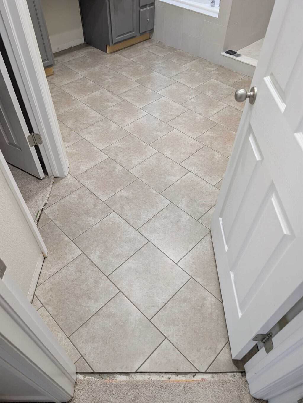 Primary floor grouted and finished