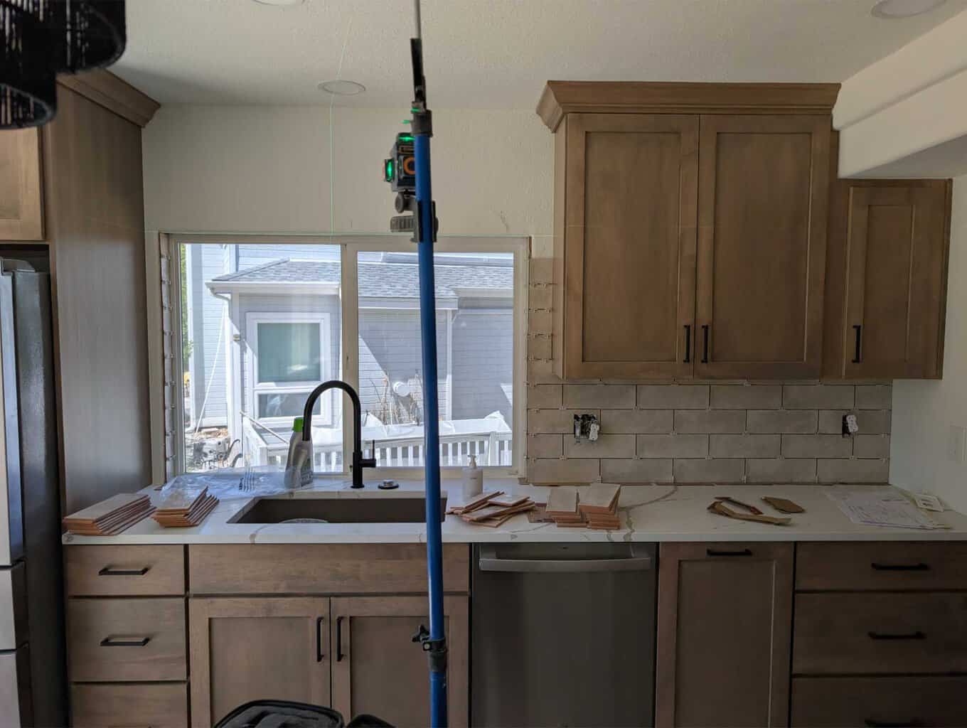 Continuing to install kitchen backsplash