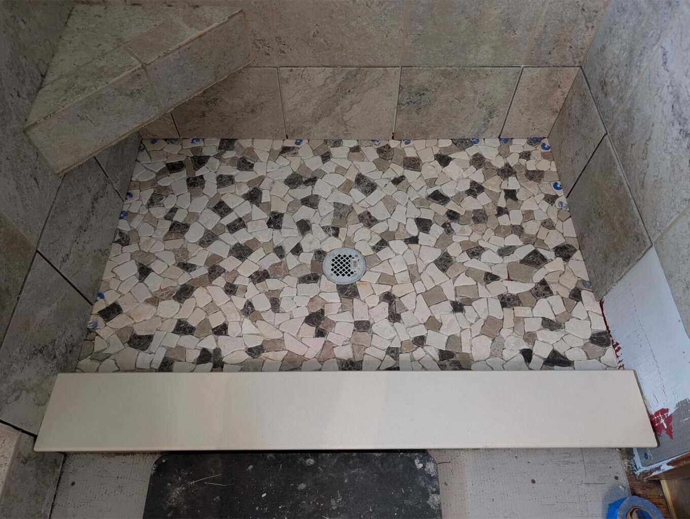 Shower floor, curb, and walls installed