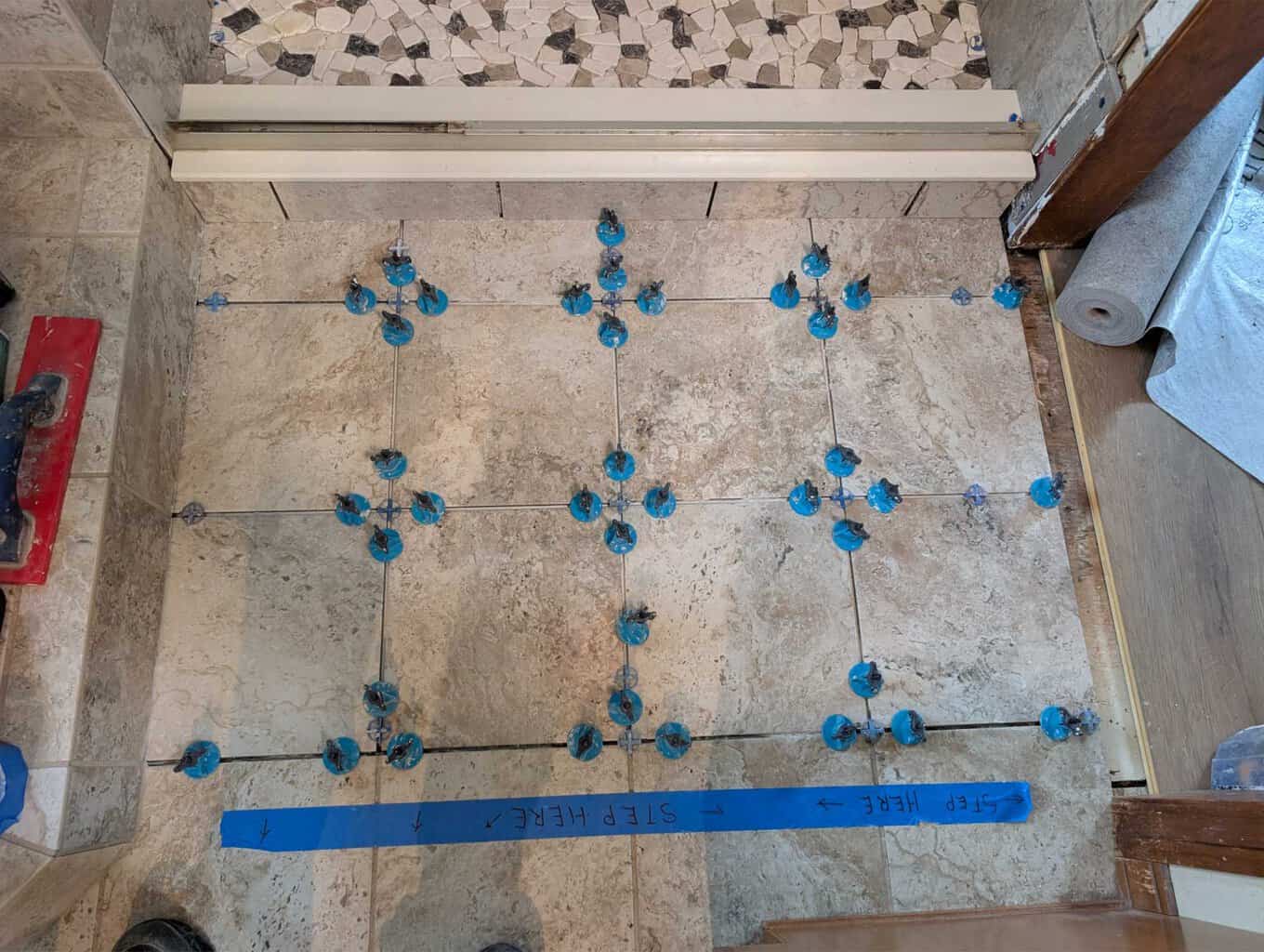 Bath floor tiles installed