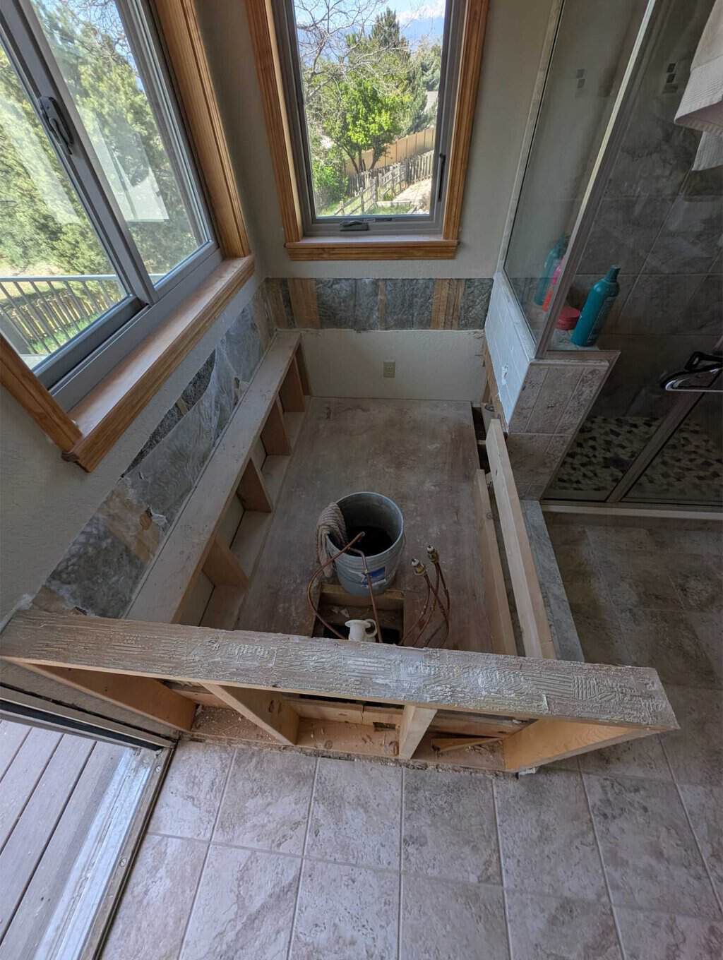 Primary bath tub and deck, skirt, surround demo'd