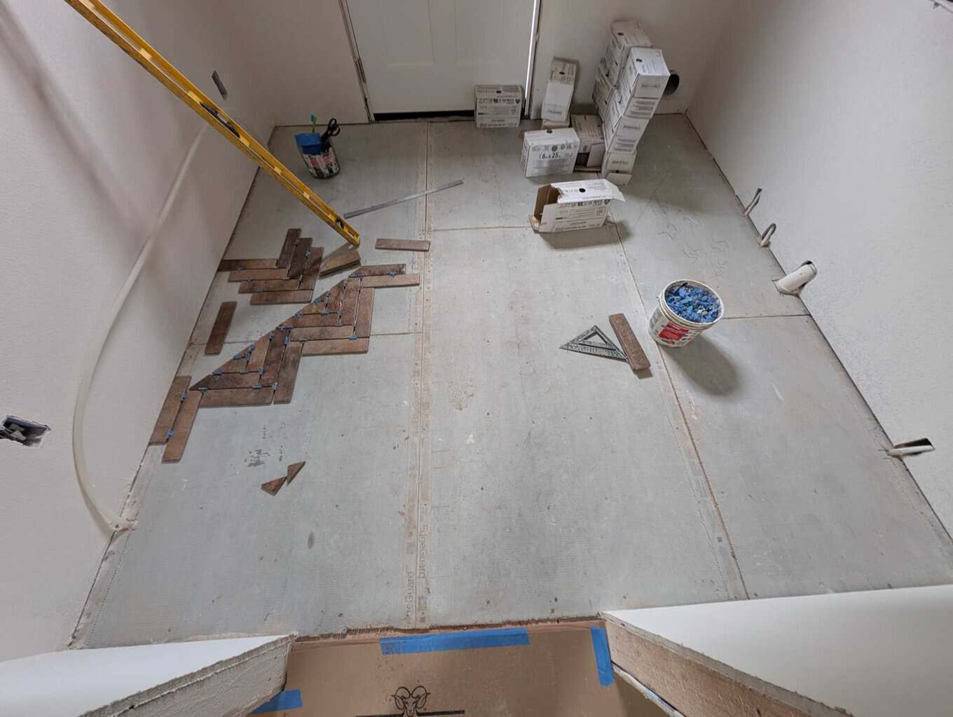 Starting to install laundry room floor