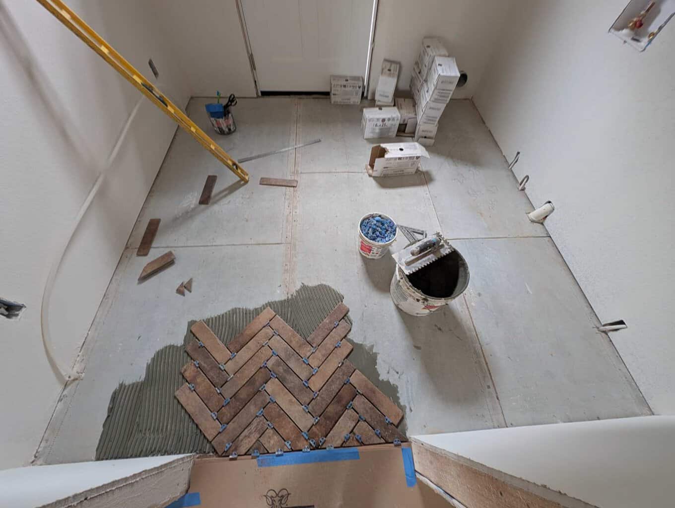 Installing floor in laundry room