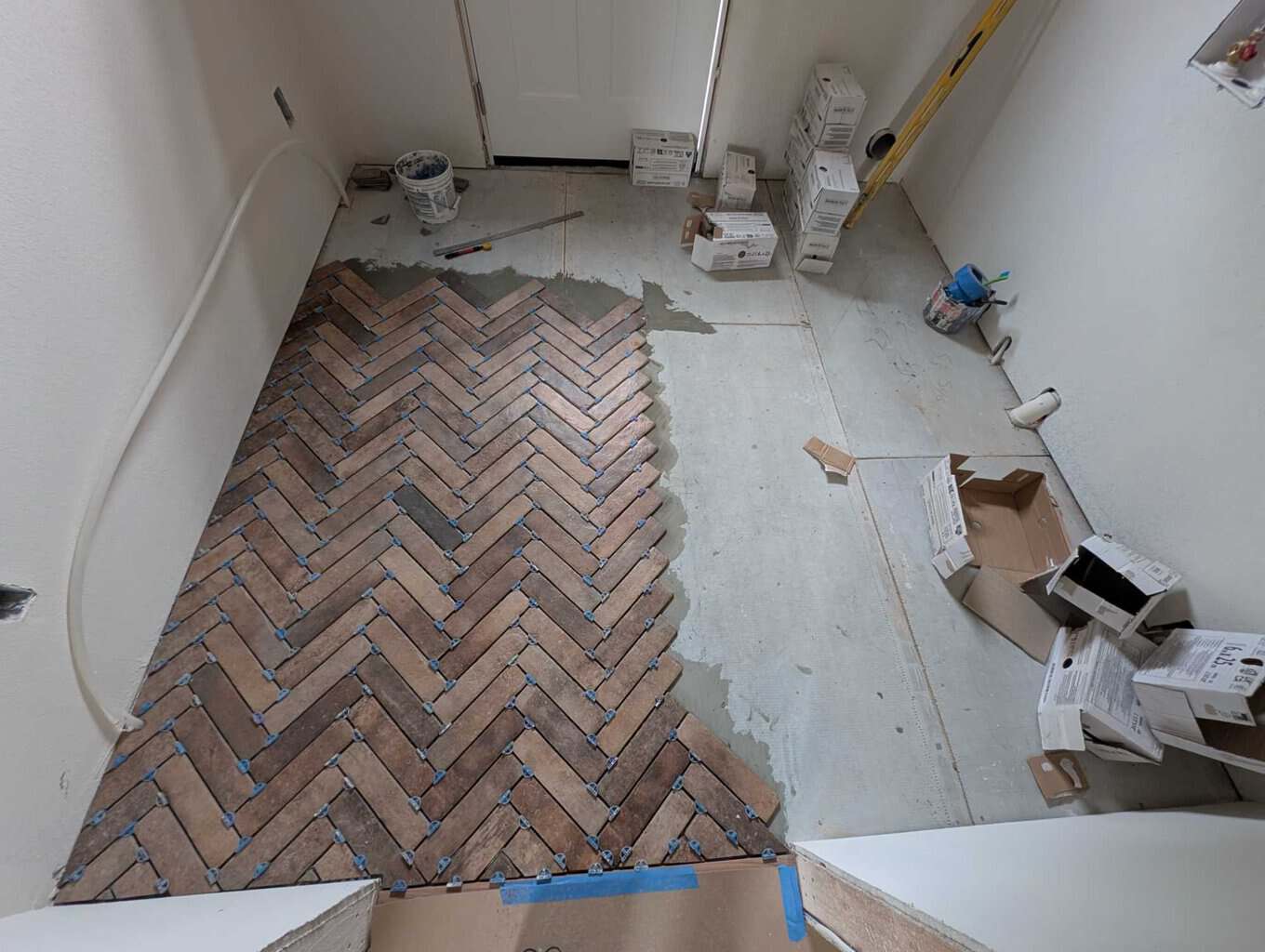 Installing floor in laundry room