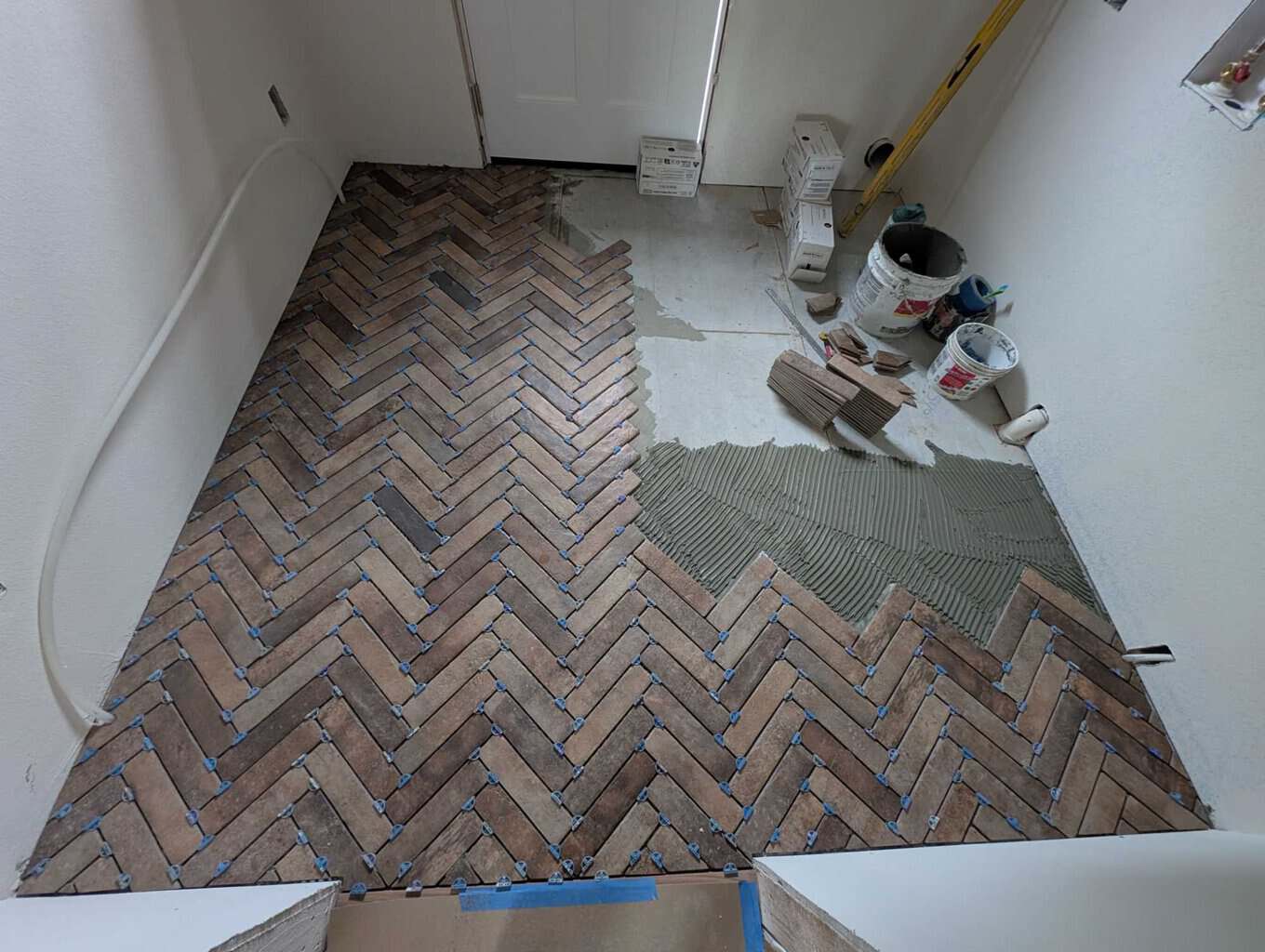 Installing floor in laundry room