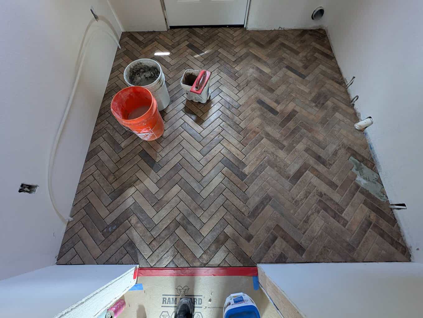 Laundry floor grout in progress