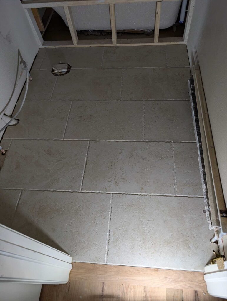 Guest bath floor grouted and finished