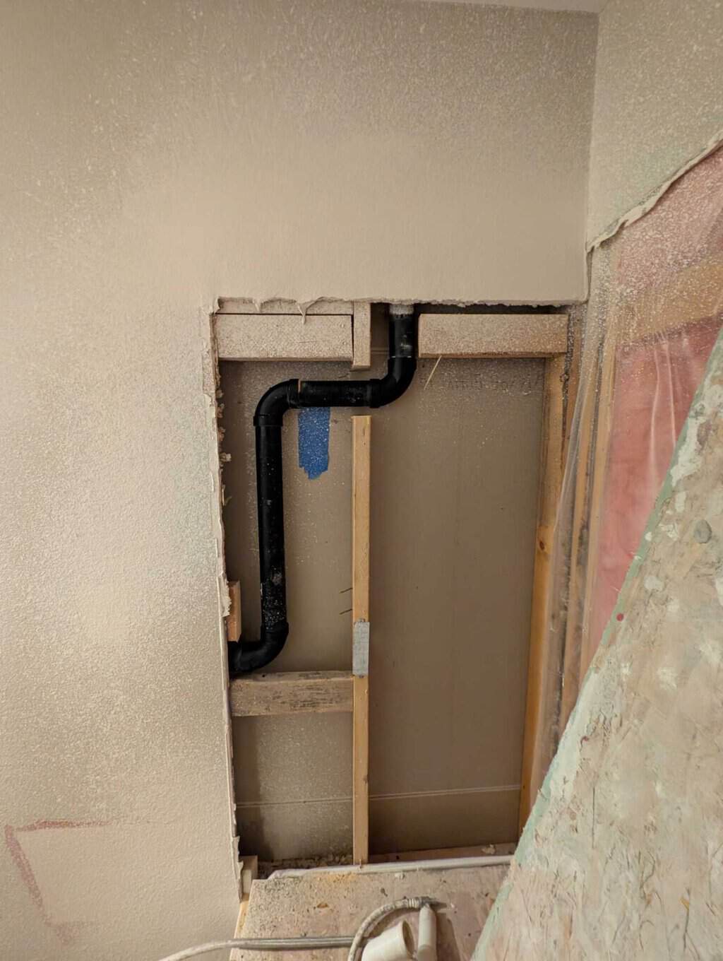 Plumbing vent pipe moved from niche area